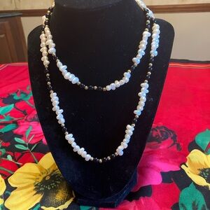 NECKLACE IS PEARL, BLACK BEADS AND GOLD SPACER BEADS. 17”
